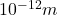 10^{-12} m