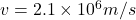 v = 2.1 \times 10^6 m/s